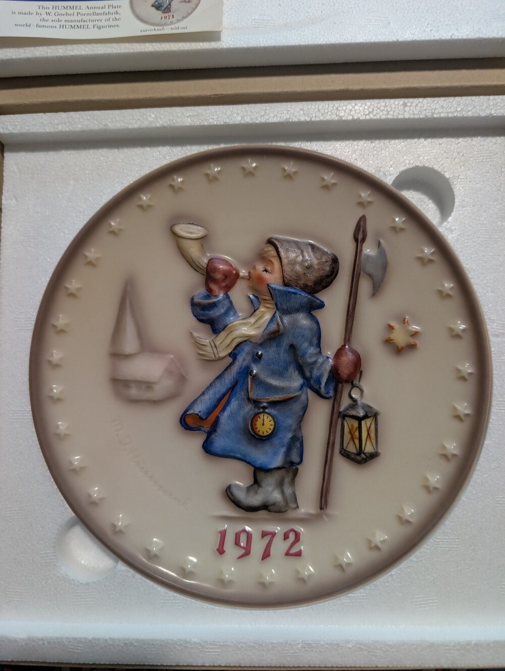 Hummel Blue Coat Boy Wall Plaque with Cream Background
